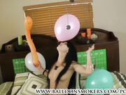 Esmi destroying balloons in her room