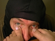 Kitty Toe in Eye 1 - At My Neighbors Feet