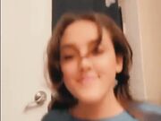 Cute teen does an outstanding striptease show