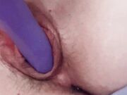 Play with my pussy with my purple vibrator