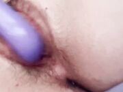 Play with my pussy with my purple vibrator