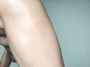 Oiled Up Tattooed Brunette Twerking