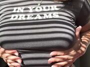 Hot wife teasing her boobs in the shadows