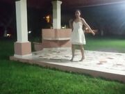 Tiny-titted Asian babe plays with herself outdoors