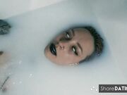 Tattooed BDSM Babe in Latex and Milk Bath