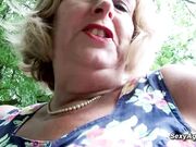 Granny plays with her pussy outdoor