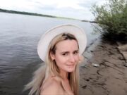 Exhibitionist Blonde Goes Nude on a River Beach