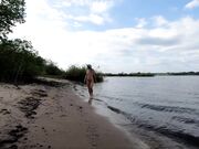 Exhibitionist Blonde Goes Nude on a River Beach