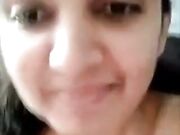 Horny amateur Indian stripping nude on webcam fingering pussy