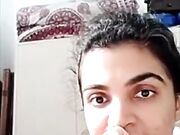 Horny amateur Indian stripping nude on webcam fingering pussy