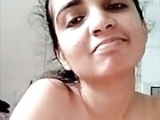 Horny amateur Indian stripping nude on webcam fingering pussy