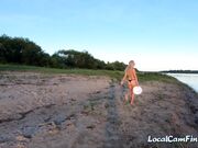 Russian Nudist on the River Shore