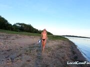 Russian Nudist on the River Shore