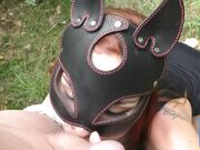 BDSM Blowjob in the Woods by Kinky Redhead in Leather Mask