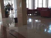 Public Nudity in a Hotel Lobby - No Panties Flash
