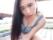 Long-Legged Beauty Shows Off by the Seaside