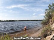 Blonde Solo Girl Cooks Naked by the Campfire