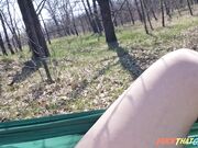 Teen girl caught masturbating in a hammock outdoors.