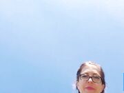 Outdoor BDSM Solo in Black Dress with Nipple Clamps and Buttplug