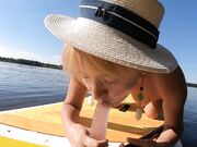 Blonde MILF Plays with Dildo and Gives Blowjob on a SUP Board