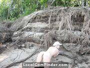 Big-Ass Blonde Rides a SUP Board Naked on a Beach