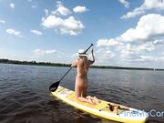 Big-Ass Blonde's Naked Walk on a Paddleboard